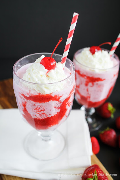 This Strawberry Bliss would be perfect for summertime or a yummy and flirty dessert for Valentine's Day! Topped with whipped cream and a cherry! | mynameissnickerdoodle.com