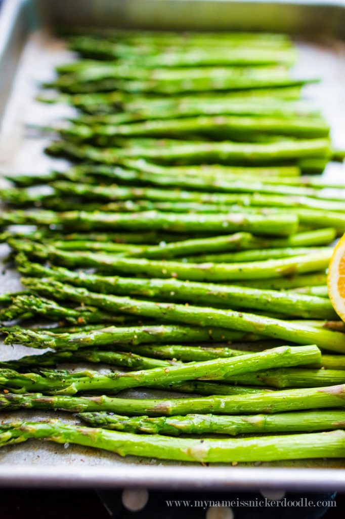 Totally easy and simple roasted asparagus that only takes minutes to prepare and cook! It's perfect side dish for an Easter or Sunday meal. | mynameissnickerdoodle.com