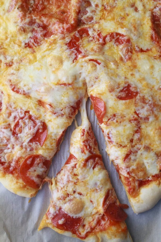 Homemade Pepperoni Pizza that is super easy to make and tastes better than any delivery!  www.mynameissnickerdoodle.com