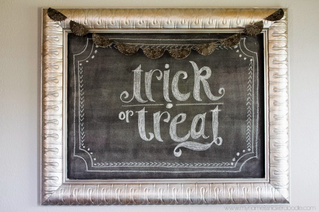 Loving my spiderweb cupcake liner banner over my favorite chalkboard!  DIY on my site!  | My Name Is Snickerdoodle