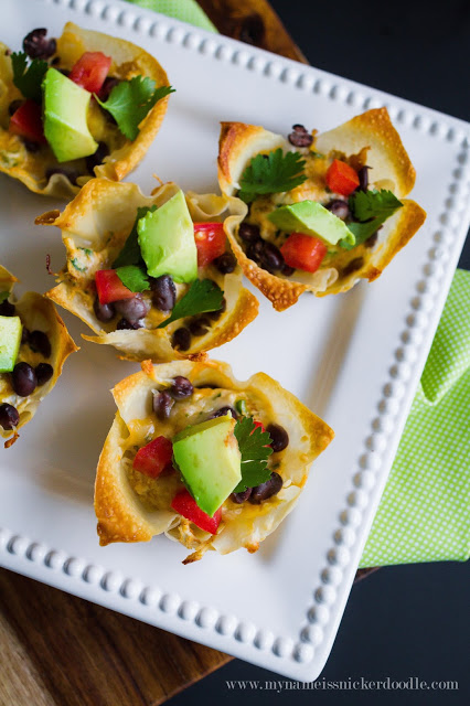 These Green Chili Chicken Enchilada Cups looks soooo good! Topped with avocado and cilantro. Super easy to make too! | mynameissnickerdoodle.com