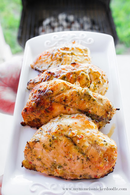 Making this Grilled Garlic Parmesan Chicken this summer! The perfect recipe to eat with a baked potato and simple salad. | mynameissnickerdoodle.com