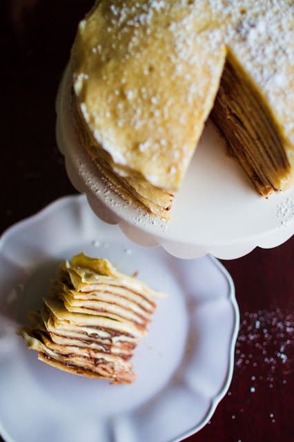 I want a slice of this Orange Cream and Nutella Crepe Cake. It looks and sounds divine! Recipe over at mynameissnickerdoodle.com