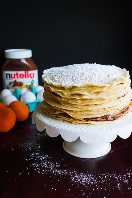This Orange Cream and Nutella Crepe Cake looks and sounds divine! Recipe over at mynameissnickerdoodle.com