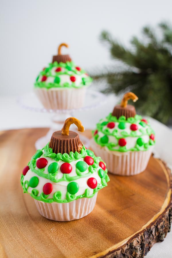 Adorable Christmas Ornament Cupcakes! So fun to make with the kids! | mynameissnickerdoodle.com