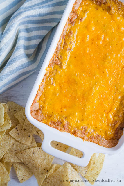 THE BEST Cheesy Bean Dip Recipe! Perfect for any party! | mynameissnickerdoodle.com